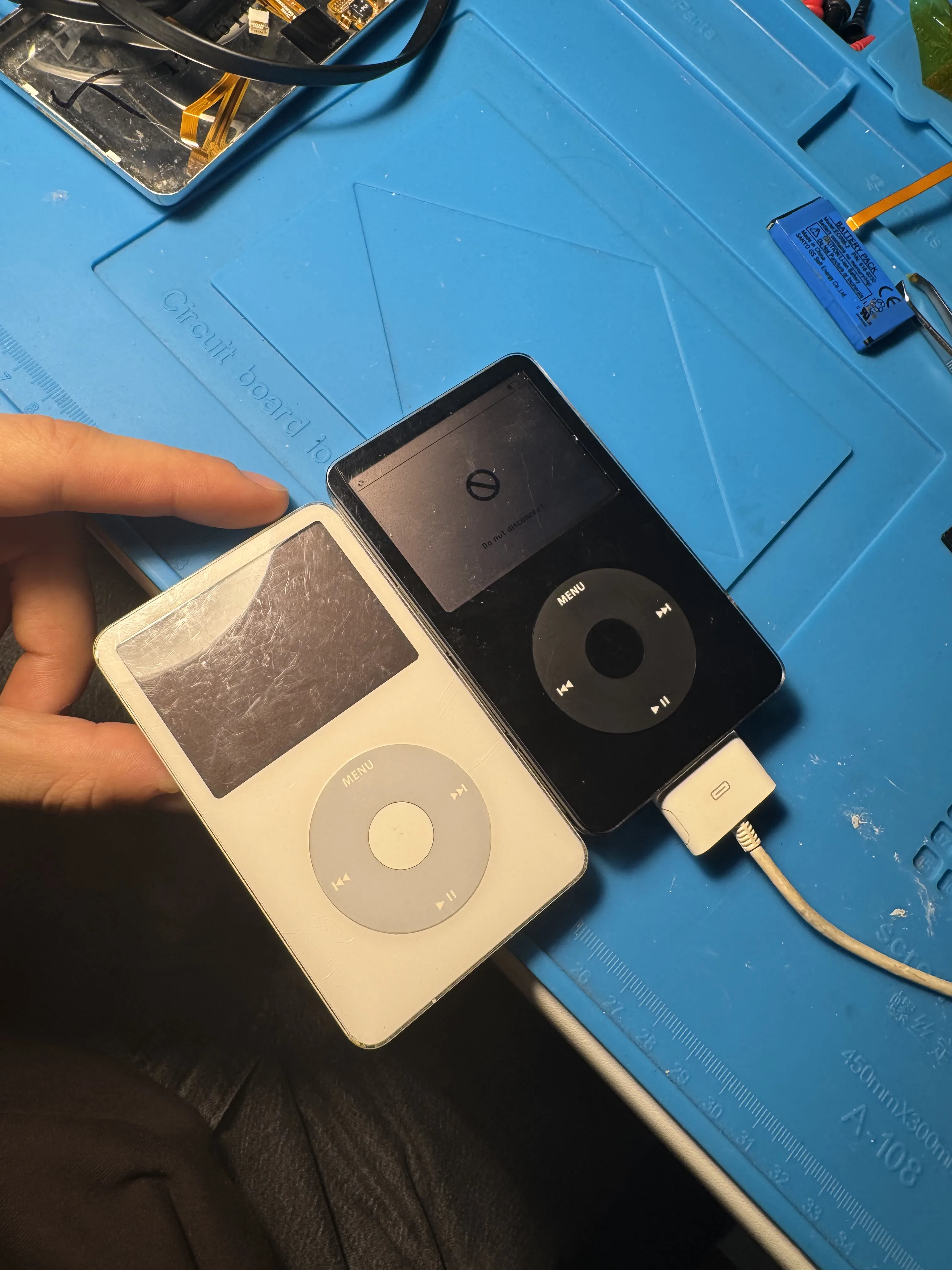 Two iPods opened before modding