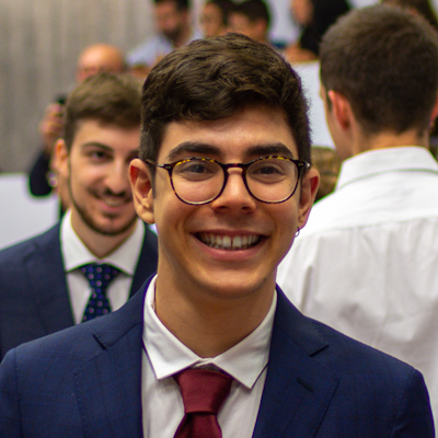 a picture of Andrea Mengascini smiling