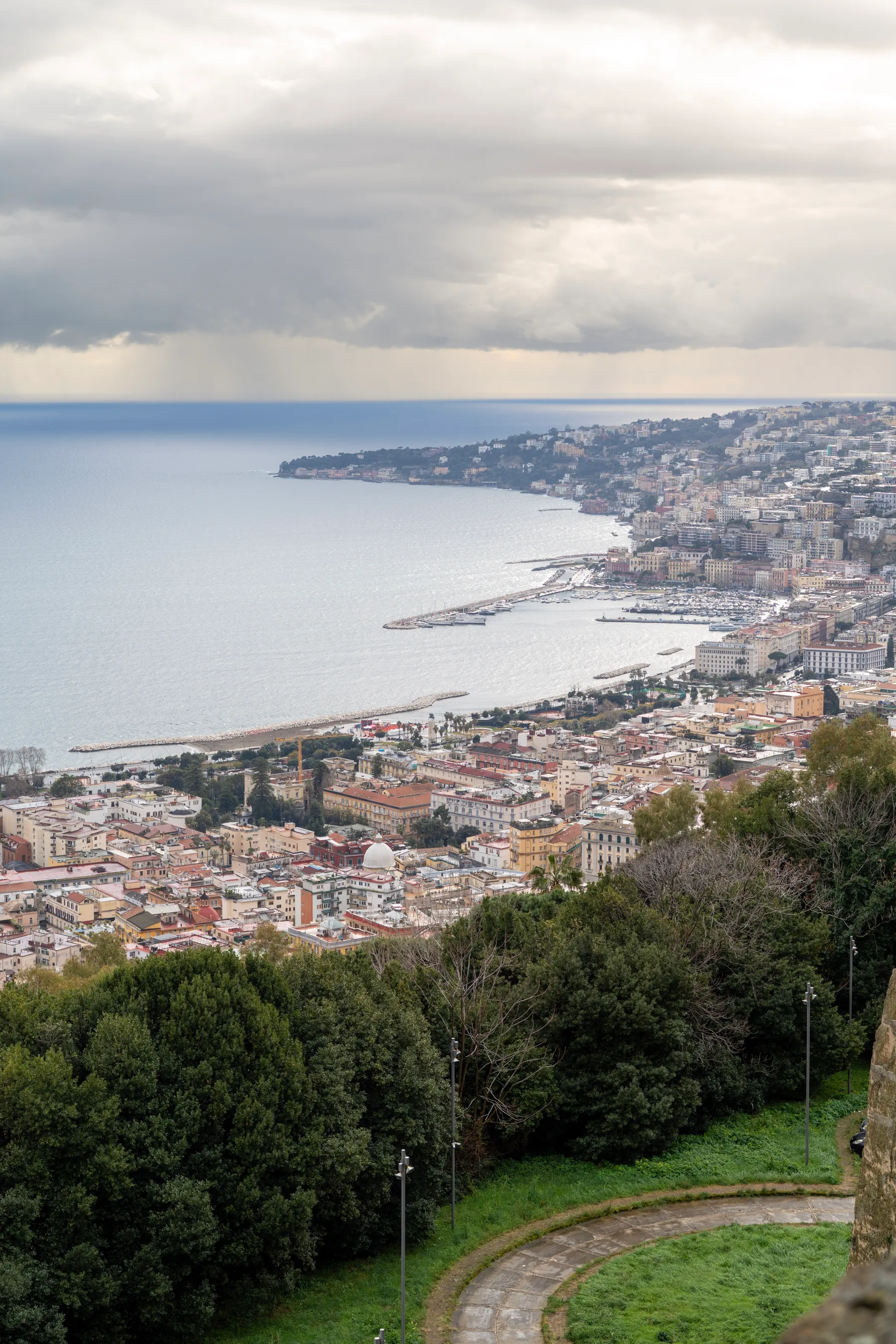 The bay from the Vomero, a shower coming in over the water.
