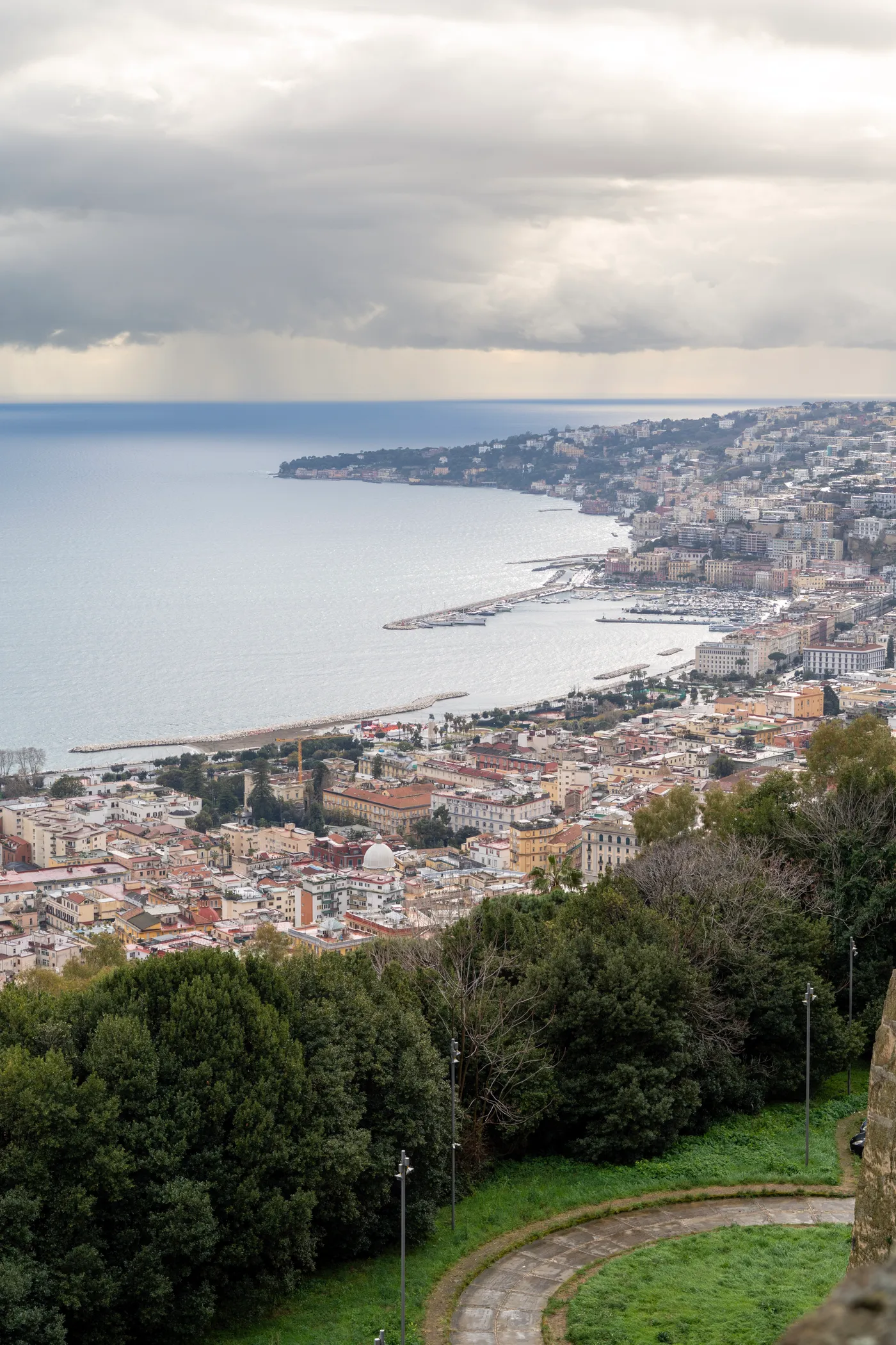 The bay from the Vomero, a shower coming in over the water.