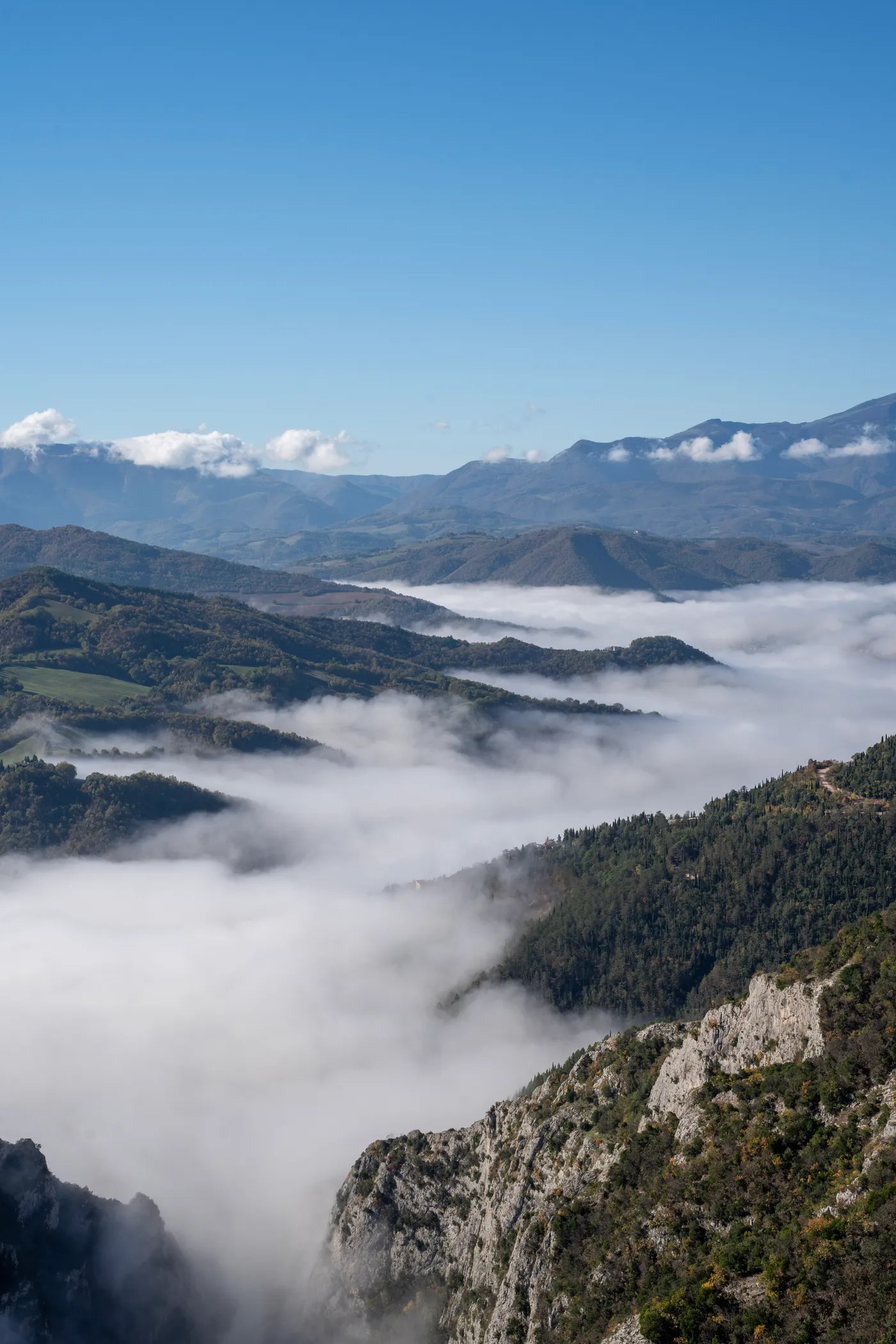 A sea of fog filling the valley, the ridges standing out of it.